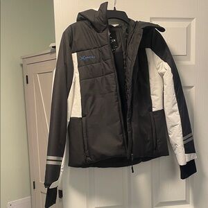 Arctix Women's Boulder Jacket in Black, White, and Slope Blue